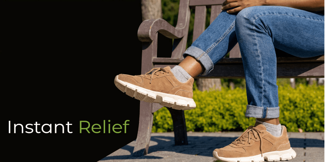 Person seated on a park bench extending their leg, demonstrating immediate hamstring cramp relief through gentle lengthening